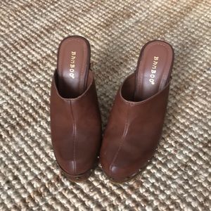 Brown clogs